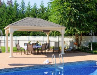 12’ x 16’ Traditional Ivory Vinyl Pavilion with Asphalt Shingles and Superior Posts In Backyard Pool Setting