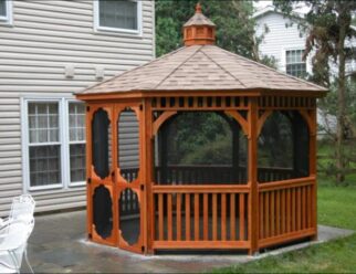 14’ Octagon Gazebo Shown in Dutch Style, with Cedar stain, Screen and Double door package, Cupola and 30 year architectural shingles.