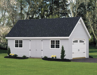 Grey Vinyl Chalet Style Shed With White Garage Door