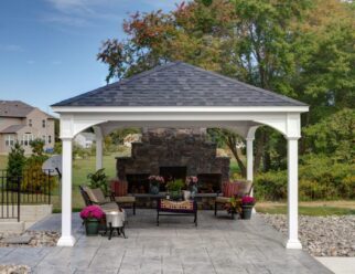 14’ x 14’ Traditional White Vinyl Pavilion Shown with Asphalt Shingles In Backyard Patio