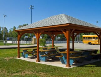 14 x 20 Traditional Wood Pavilion with Cedar Stain and Asphalt Shingles In A Public Park