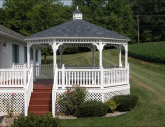 16’ Octagon Gazebo Shown in Dutch Style with standard 8 post bolted inside rails to existing deck, White paint, Cupola and 30 year architectural shingles.