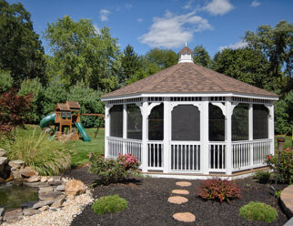 20' Octagon Colonial Style, White Vinyl Gazebo With Cupola, Screens In A Backyard