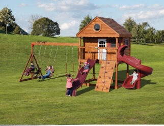 Model 1254 - 16'x24' Playset with 6'x8 Tower, 5' High Deck, 4'x8' Playhouse, 22"x96" Porch and Loft, 3 Windows, 21" x 57" Door, Asphalt Roof, 2 Octagon Windows, 3-Position Single Swing Beam, Double Glider, 2 Swings, 10' Waterfall Slide, 5' Spiral Slide, 5' Rock Wall