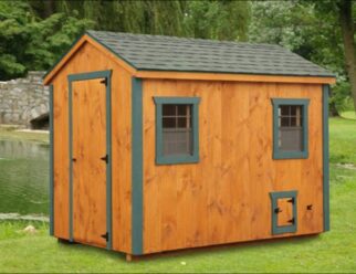 Stained wood 6'x10' Amish A-Frame Amish Chicken Coop with black shingles, green trim accents.