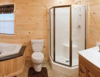 Bathroom With Jacuzzi and Corner Shower