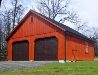 Board And Batten Detached Garage With High Roof Pitch