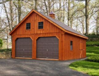 Two Story Cedar Wooden Detached Garage With Brown Vinyl Garage Doors