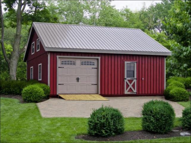 Two Story Red Wooden Board and Batten Detached Garage
