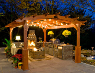 12’ x 17’ Wooden Hearthside Amish Pergola With Superior Posts, Canyon Brown Stain With Fireplace, Overhead Lights