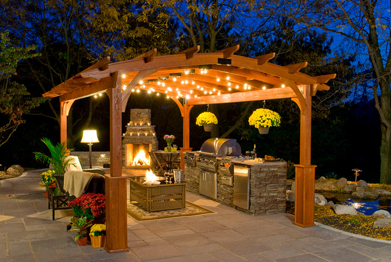 12’ x 17’ Wooden Hearthside Amish Pergola With Superior Posts, Canyon Brown Stain With Fireplace, Overhead Lights