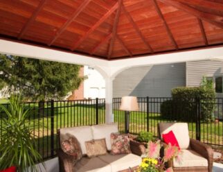 Interior Ceiling Of Traditional Vinyl Pavilion With Patio Furniture In Backyard