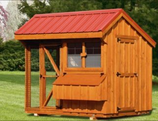 Stained wood 6;x10' Amish Chicken Coop with red metal overhang roof, two windows, feeding box, and built in cage