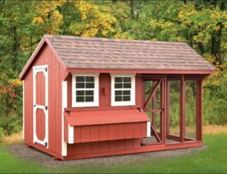 Red wood 8'x12' Combination Amish Chicken Coop with brown singled roof, feeding box, white trim accents, and built in cage.