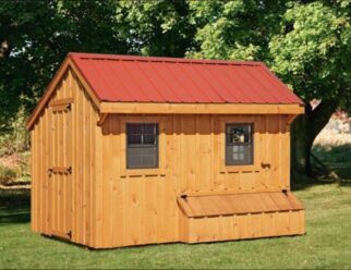 Natural wood Amish 7'x12' Chicken coop with red metal overhang roof, two windows, and a half feeding box