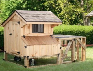 Natural wood 3'x4' Amish A-Frame tractor chicken coop with wheels, overhead roof and built in cage.