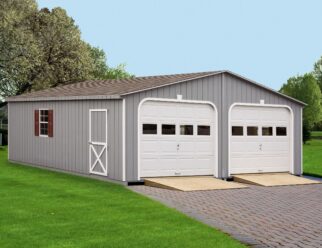 Grey Wooden Double Wide Garage With White Garage Doors