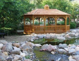 12’ x 20’ Wood Oval Gazebo Shown in Dutch Style, Cupola, Benches, Cedar Stain, Cedar Shake Shingles