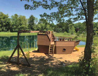 Model 200 - Pirate Ship 8'x5'5"x9' Boat with 142 sq. ft. Play Deck, Ground Level Deck, 4' and 6' Decks, Entry Ladder, Ramp, 10' Wave Slide, Rock Wall, Inside Ladders, 3-Position Swing Beam, Double Glider, 2 Belt Swings, and 8' High Swing Beam