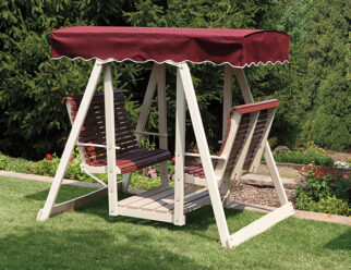 Beige POLYWOOD Double Lawn Swing with Maroon Canvas Top and Maroon Rollback Seats in a backyard.