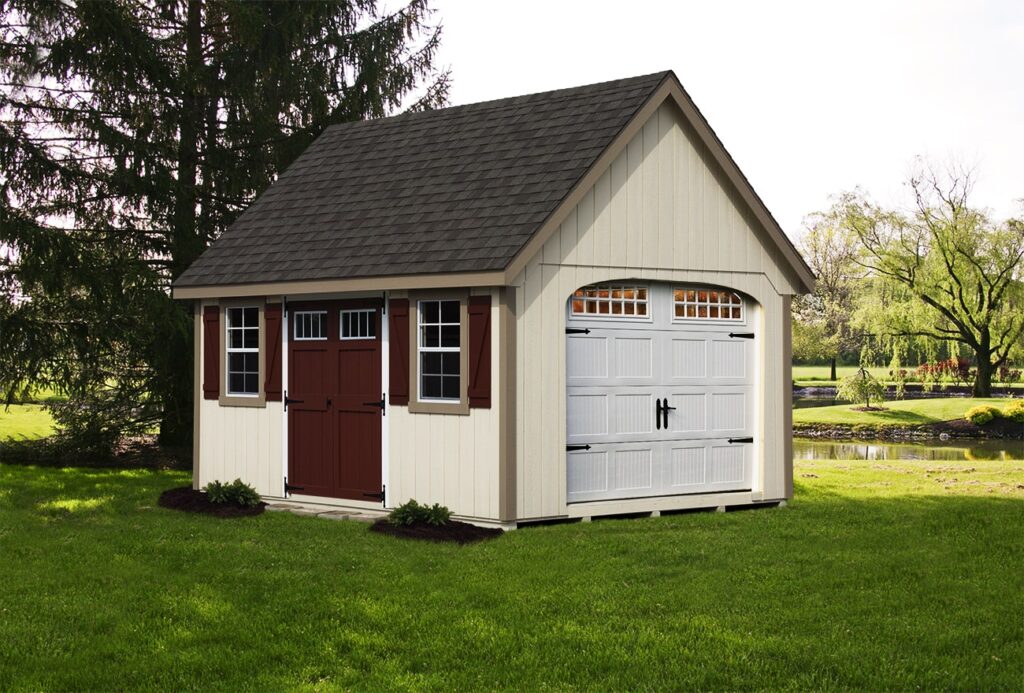 a small shed with a garage door and a maroon door with matching shutters.