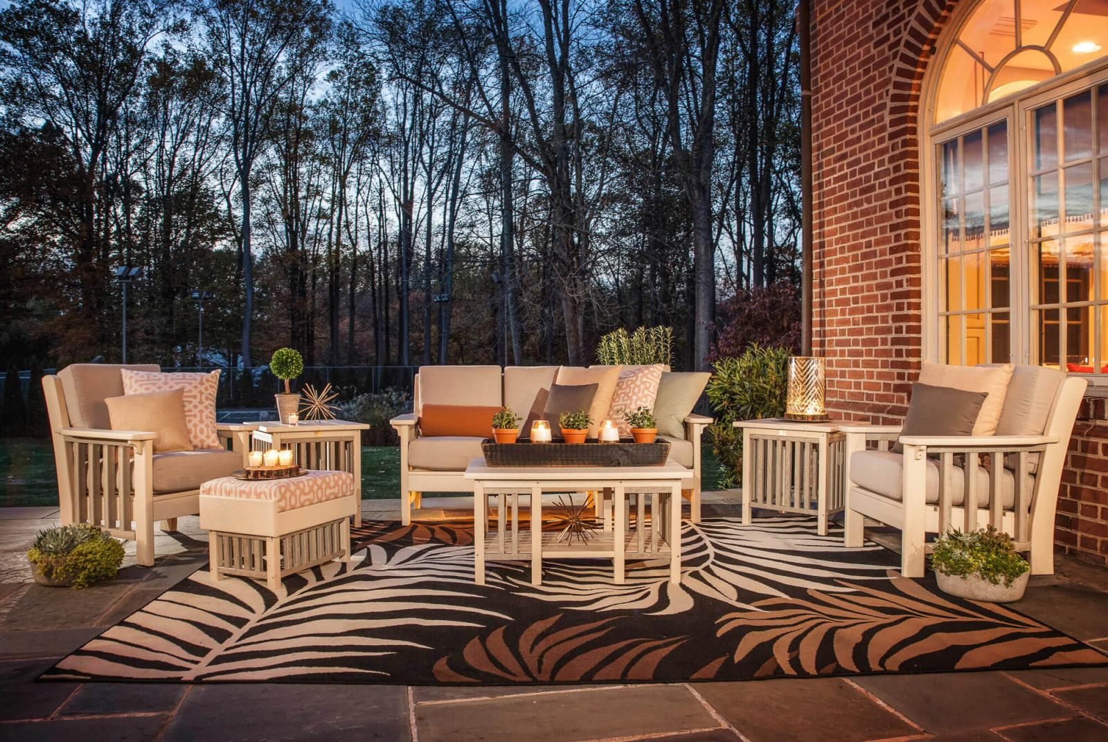 conversation seating on an outdoor patio at night