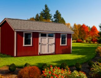 Red Wooden Monterey Barn Shed With White Door And Two Windows With White Trim Around Them In A Backyard