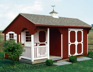 photo of a 10' x 16', Red T-111 Carriage outdoor structure with white detail