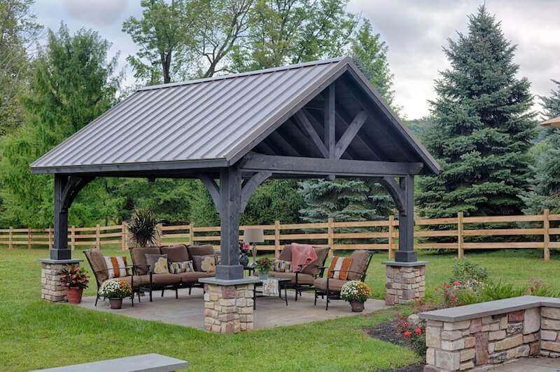 Wood pavilion covering lawn furniture