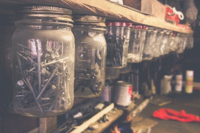 Mason jars being used as storage for nails
