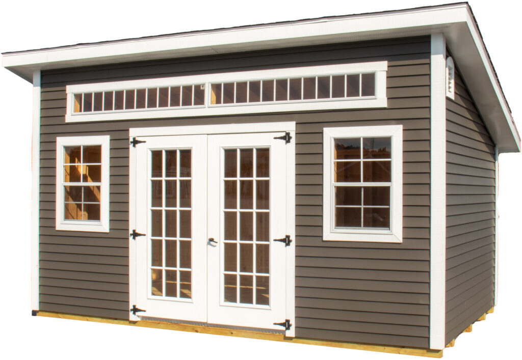 Gray vinyl studio shed with ample windows for excellent lighting