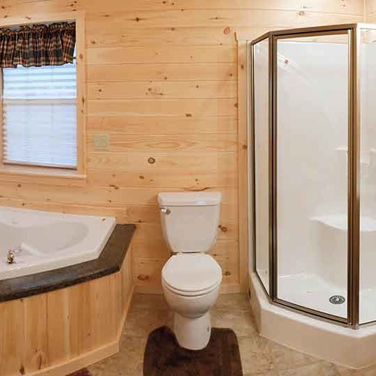 Bathroom interior with a corner shower and jacuzzi