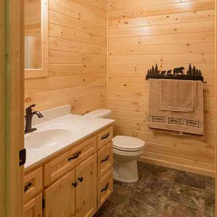 Bathroom interior with vanity and extra cabinets