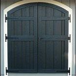 Green double arched shed doors