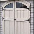 White double arched barn doors