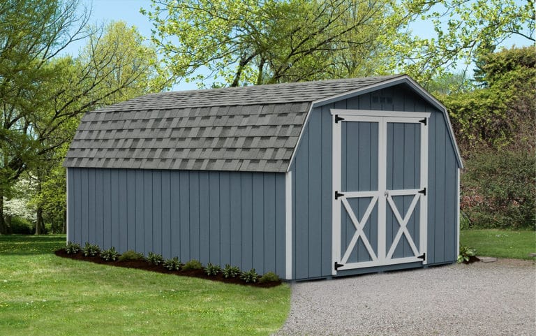 a blue dutch barn shed with white trim around the double entrance doors.