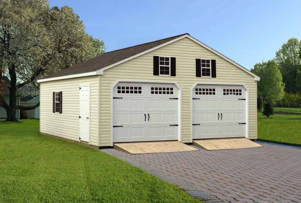 a yellow garage with two white garage doors and matching windows above each garage door. 