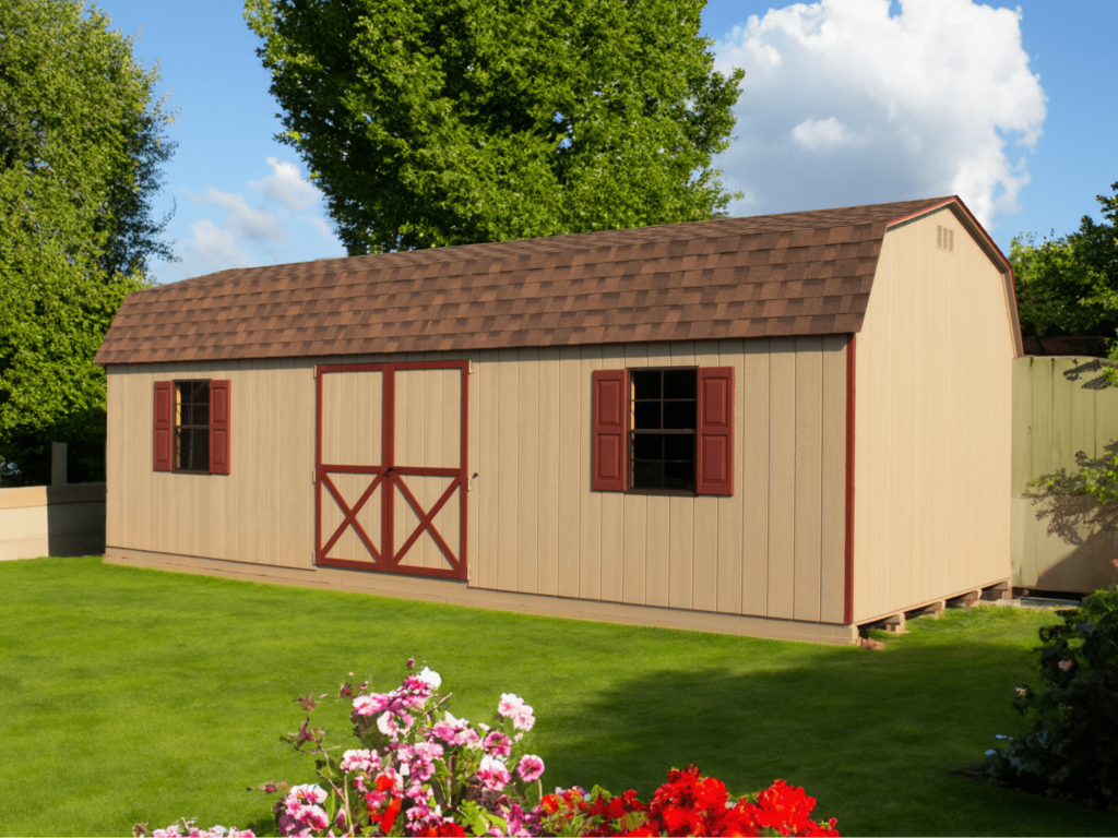 a large shed with architectural shingles and red shutters and trim. 