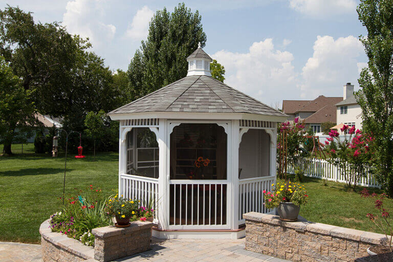 White gazebo to help with backyard privacy