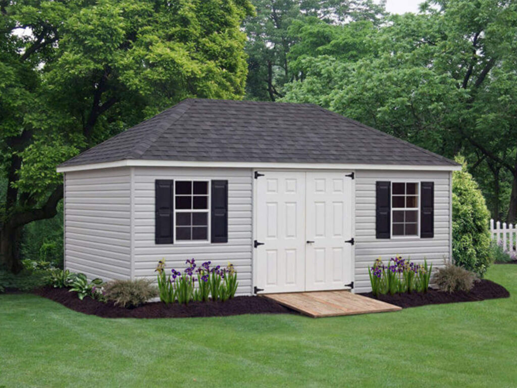 Gray villa shed in a yard