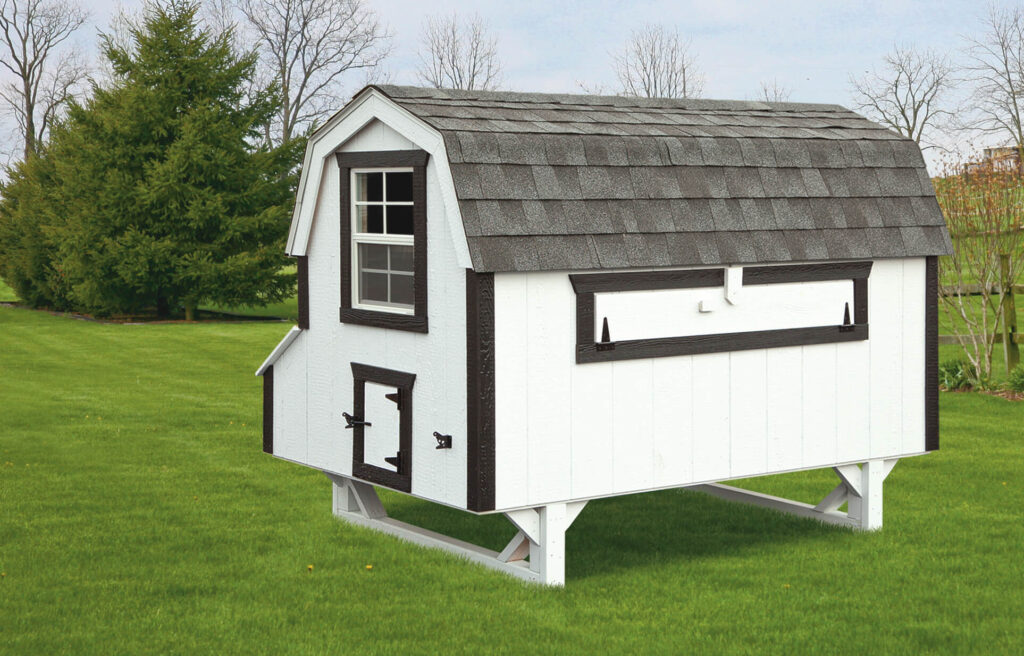 White Dutch chicken coop for sale in a yard