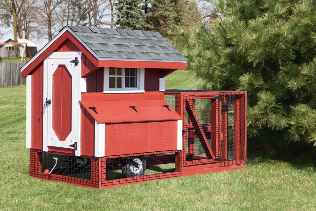 Red tractor chicken coop idea in a yard