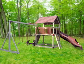 Tan and red vinyl swing set with a tube slide and three swings