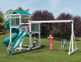 White and green vinyl swing set with kids playing on it