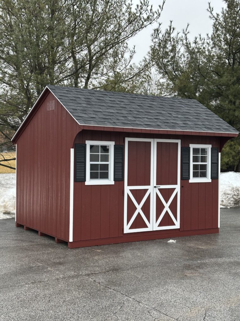 In stock Quaker red shed with white trim
