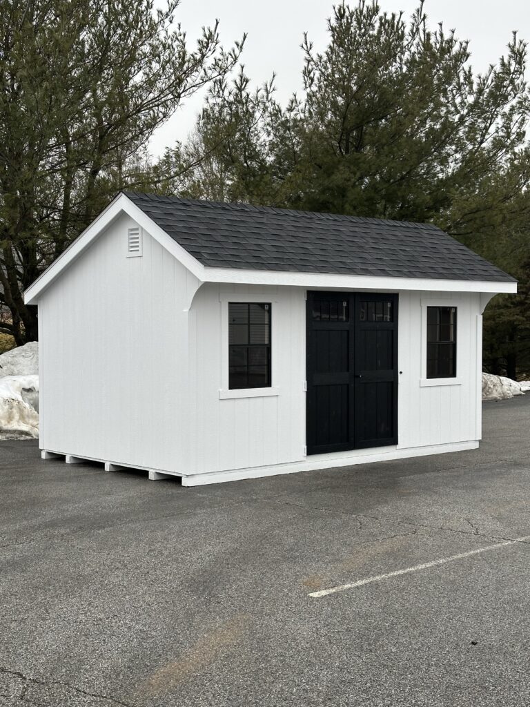 In stock quaker white shed with black doors.