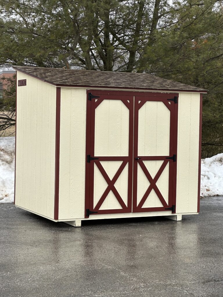 in stock 6x8 mini lean to tan and red trim shed