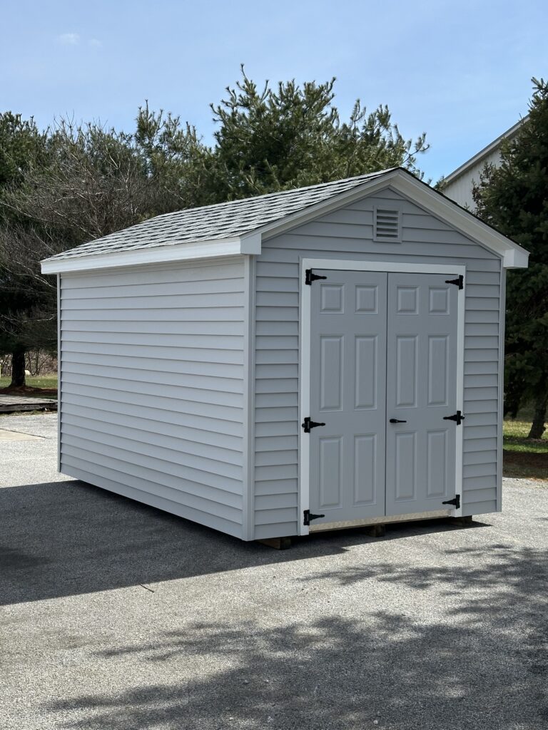 light colored 8x12 cottage in stock shed