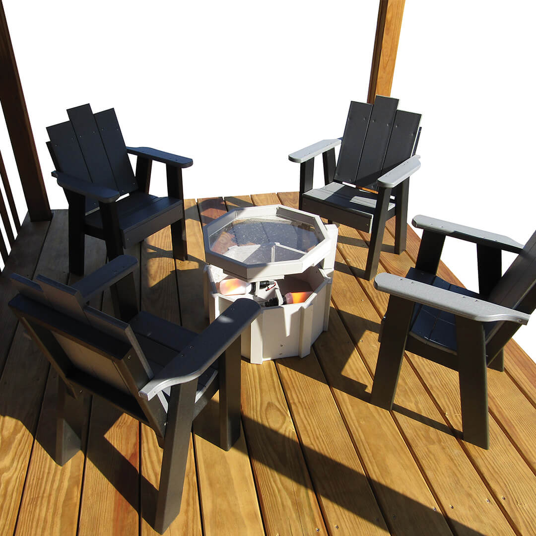 Deck with black chais and white firepit