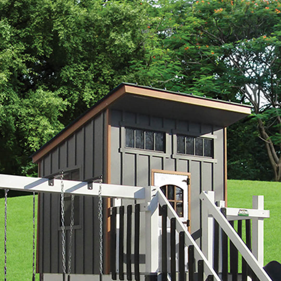 Brown and gray poly standing seam roof on a gray swing set